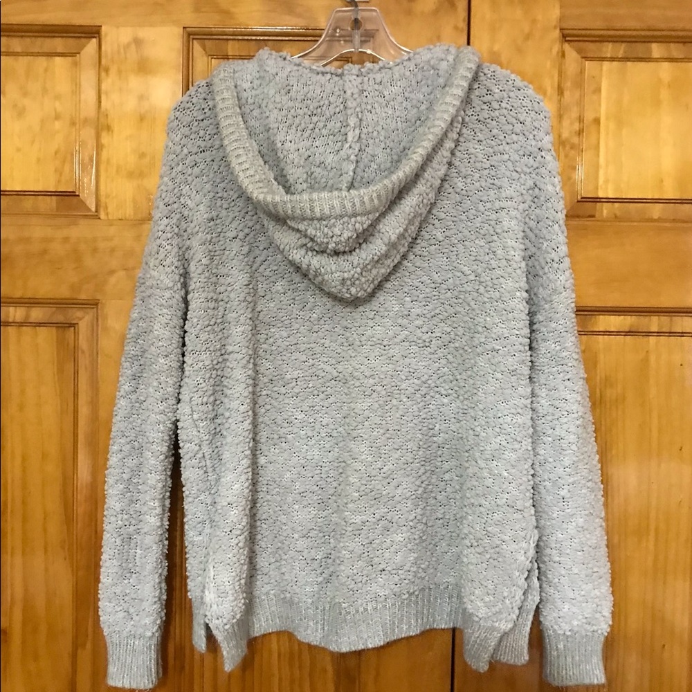 Staccato Light Gray Hooded Sweater Top
Size Small 4 - 6
100% Acrylic
Oversized - Picture 7 of 10